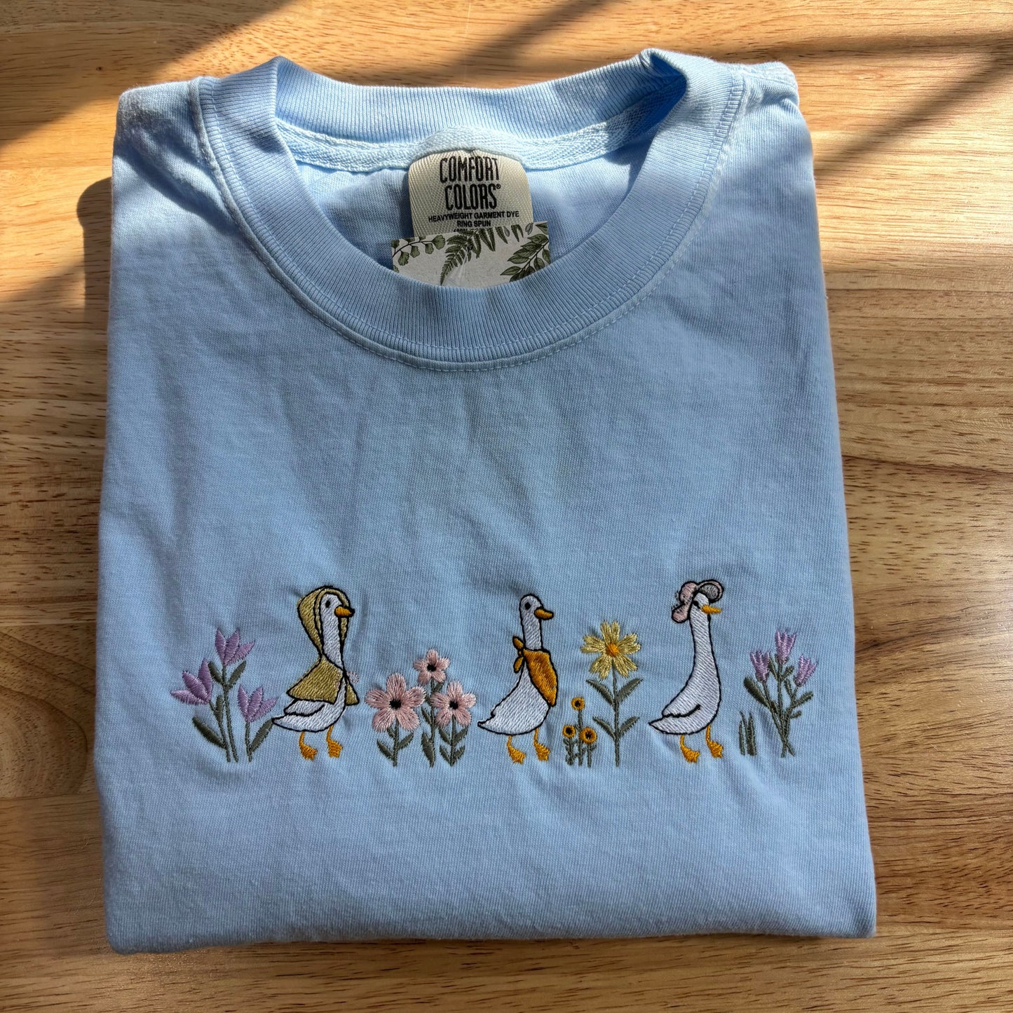 Goose and Flowers Dainty Embroidery Comfort Colors Tee